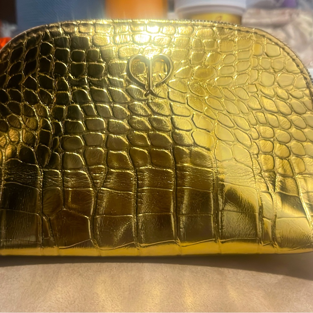 Gold crocodile round-neck makeup bag